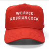 Red MAGA hat that reads WE SUCK RUSSIAN COCK